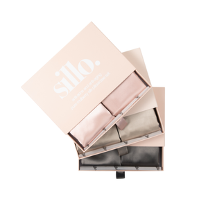 Blush Pink, Light Champagne, and Charcoal Grey Sillo silk pillowcase gift set with Sillo Care Washbag — 22 Momme 6A grade organic Mulberry silk pillowcases in recyclable, eco-friendly packaging for luxury self-care, gifting, and anti-aging skin benefits.