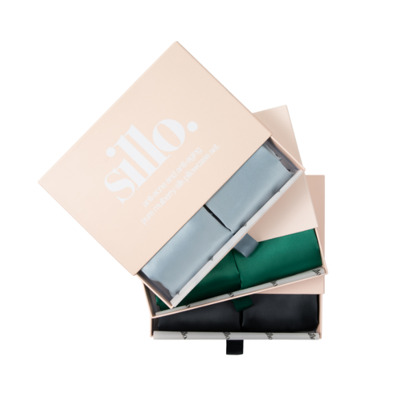 Haze Blue, Emerald Green, and Black Sillo silk pillowcase gift set with Sillo Care Washbag — 22-Momme 6A grade organic Mulberry silk pillowcases in recyclable, eco-friendly packaging for luxury self-care, gifting, and anti-aging skin benefits.