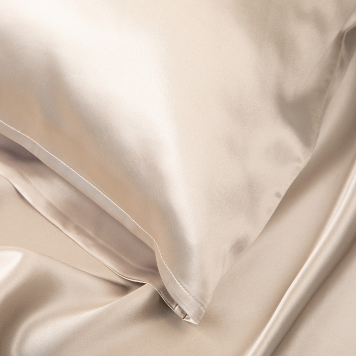Light Champagne Sillo silk pillowcase set of 2 with Sillo Care Washbag — 22 Momme 6A grade organic Mulberry silk for acne-prone, sensitive skin and frizz-free hair; cooling, temperature-regulating, hypoallergenic, eco-friendly.