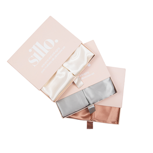 Ivory White, Silver, and Rose Pink  Sillo silk pillowcase gift set with Sillo Care Washbag — 22 Momme 6A grade organic Mulberry silk pillowcases in recyclable, eco-friendly packaging for luxury self-care, gifting, and anti-aging skin benefits.