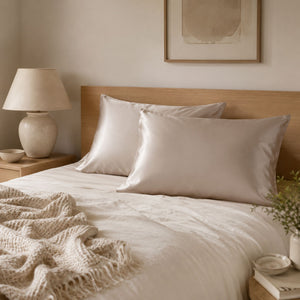 Sillo silk pillowcase 2 pack in light champagne  22 momme mulberry silk in a bedroom setting 