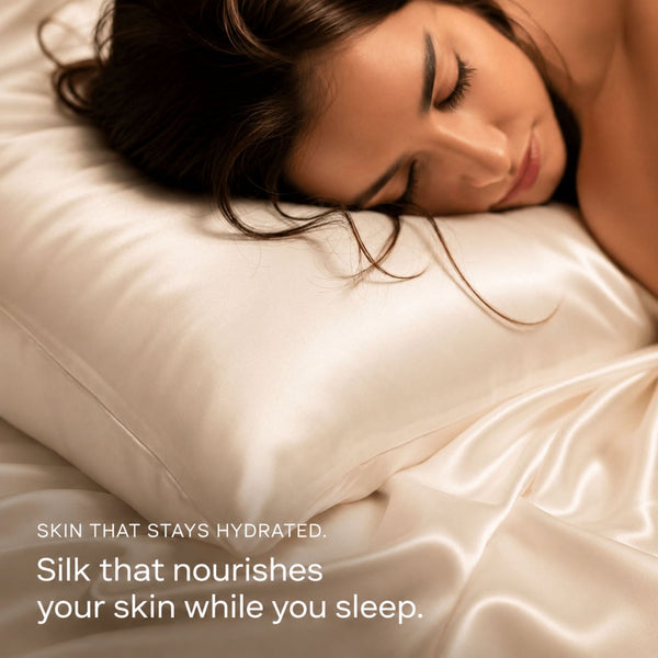 Lifestyle image of woman sleeping on Ivory White Sillo silk pillowcase set, smooth, temperature-regulating silk that helps prevent acne, wrinkles, and frizz while caring for sensitive skin.
