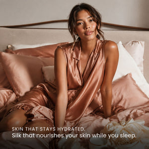 Lifestyle image of woman sleeping on Rose Pink Sillo silk pillowcase — smooth, temperature-regulating silk that helps prevent acne, wrinkles, frizz, breakage, while caring for sensitive skin.