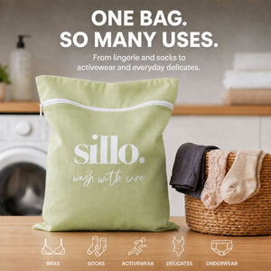 Sillo Care delicate laundry washbags 2 pack in pistachio color on a laundry counter with a basket of everyday delicates and benefit icons, mesh laundry bags for washing lingerie, bras, baby clothes, socks, sweaters and activewear, designed to prevent stretching, tangling and fabric damage.